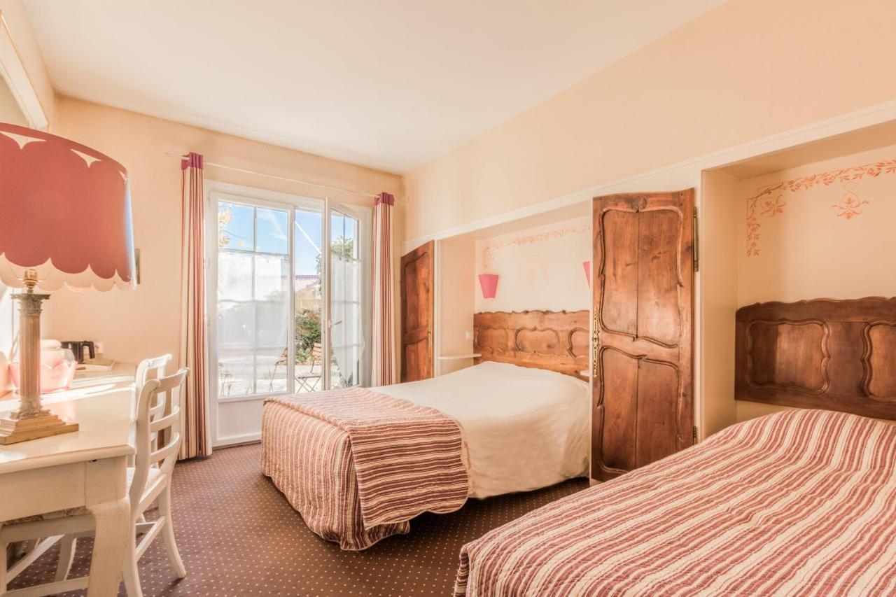 Le Manoir De L'antiquite Hotel